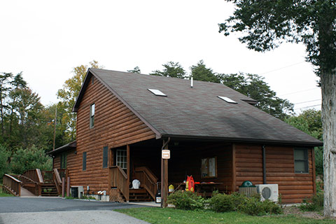 The modern log cabin has skylights and air conditioning at Little Buffalo State Park.