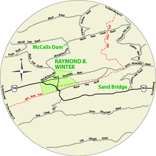 A circular map that shows the roads surrounding Sand Bridge State Park