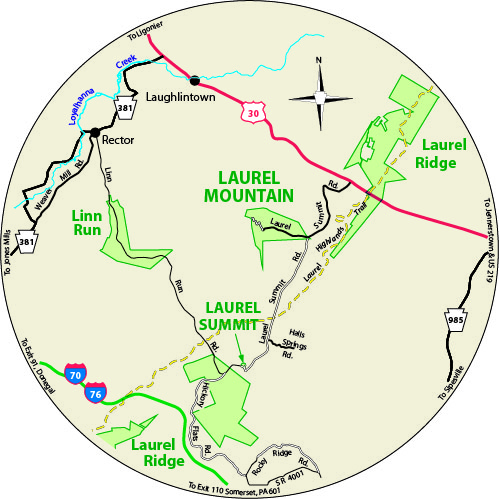 A circular map that shows the roads surrounding Laurel Summit State Park