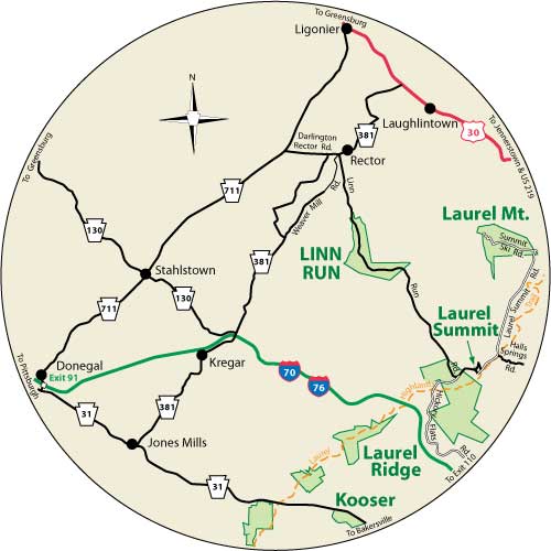 A circular map that shows the roads surrounding Linn Run State Park